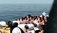Migrants are seen after being rescued by MV Aquarius, a search and rescue ship run in partnership between SOS Mediterranee and Medecins Sans Frontieres in the central Mediterranean Sea, June 12, 2018. Karpov / SOS Mediterranee/handout via Reuters