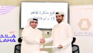Abdulrahman Essa Al Mannai (left), President and CEO of Milaha, and Nasser Hassan Al Naimi, Managing Director of Barzan Holdings, after signing the MoU, yesterday.