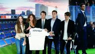 New Real Madrid coach Julen Lopetegui poses with his family during the presentation. Reuters/Juan Medina