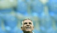 Iran's coach Carlos Queiroz leads a training session at Saint Petersburg Stadium on June 14, 2018, ahead of the Russia 2018 World Cup football game Iran vs Morocco.  AFP / Gabriel Bouys

