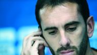 Uruguay's defender Diego Godin attends a press conference at Ekaterinburg Stadium in Ekaterinburg on June 14, 2018, a day ahead the team's Russia 2018 World Cup Group A opening football match against Egypt. AFP / Jorge Guerrero


