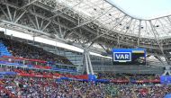 Referees review the Video replay during the Russia 2018 World Cup Group C football match between France and Australia at the Kazan Arena in Kazan on June 16, 2018. (AFP / Kirill KUDRYAVTSEV)