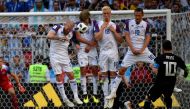 Argentina's forward Lionel Messi (R) kicks a free kick during the Russia 2018 World Cup Group D football match between Argentina and Iceland at the Spartak Stadium in Moscow on June 16, 2018. (AFP / Alexander NEMENOV)