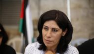 
Khalida Jarrar, a Palestinian Member of Parliament (MP) from Ramallah, speaks during an interview with Reuters at her solidarity tent erected outside the headquarters of the Palestinian parliament in the West Bank city of Ramallah August 21, 2014. (Reut