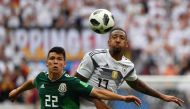 Mexico's forward Hirving Lozano (L) vies with Germany's defender Jerome Boateng during the Russia 2018 World Cup Group F football match between Germany and Mexico at the Luzhniki Stadium in Moscow on June 17, 2018. AFP / Yuri CORTEZ 