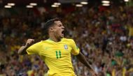 Brazil's Philippe Coutinho celebrates scoring their first goal. Reuters/Marko Djurica

