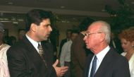 Former Israeli Prime Minister Yitzhak Rabin (R) speaks with former energy minister Gonen Segev during a conference in Jerusalem, in this file photo released by the Israeli Government Press Office (GPO), obtained by Reuters on June 18, 2018. REUTERS/GPO/Ha
