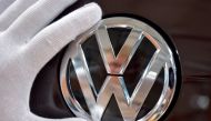 FILE PHOTO: Mechanic staff work on the production line of Volkswagen e-Golf in the Glaeserne Manufaktur plant in Dresden, Germany May 8, 2018. REUTERS/Matthias Rietschel/File Photo