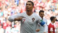 Portugal's forward Cristiano Ronaldo celebrates his opening goal for Portugal during the Russia 2018 World Cup Group B football match between Portugal and Morocco at the Luzhniki Stadium in Moscow on June 20, 2018. AFP / Francisco LEONG 

