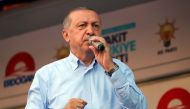 Turkish President and the leader of the Justice and Development Party (AK Party) Recep Tayyip Erdogan addresses the crowd during Turkey's ruling AK Party’s rally in Mardin, Turkey on June 20, 2018. (Osman Öksüz - Anadolu Agency)