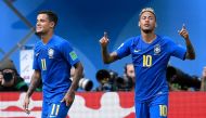 Brazil's forward Neymar (R) celebrates a goal beside Brazil's forward Philippe Coutinho during the Russia 2018 World Cup Group E football match between Brazil and Costa Rica at the Saint Petersburg Stadium in Saint Petersburg on June 22, 2018. AFP / Gabri
