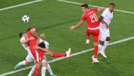Serbia's forward Aleksandar Mitrovic (2L) vies for the ball with Serbia's midfielder Adem Ljajic (3L) and Switzerland's defender Stephan Lichtsteiner (L) during the Russia 2018 World Cup Group E football match between Serbia and Switzerland at the Kalinin