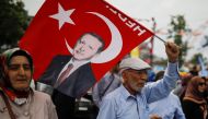 Supporters of Turkish President Tayyip Erdogan attend his election rally in Istanbul, Turkey June 23, 2018. REUTERS/Alkis Konstantinidis