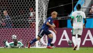 Japan's Keisuke Honda celebrates scoring their second goal REUTERS/Max Rossi