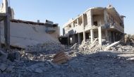 Destroyed buildings are seen after Assad Regime and its supporters carried out an airstrike over opposition controlled Daraa, Syria on June 25, 2018. Ammar Al Ali - Anadolu
