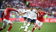 France's forward Kylian Mbappe (C) vies with Denmark's midfielder Thomas Delaney (R) during the Russia 2018 World Cup Group C football match between Denmark and France at the Luzhniki Stadium in Moscow on June 26, 2018. / AFP / FRANCK FIFE