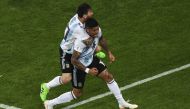 Argentina's defender Marcos Rojo (R) celebrates, with Argentina's forward Lionel Messi, scoring a goal during the Russia 2018 World Cup Group D football match between Nigeria and Argentina at the Saint Petersburg Stadium in Saint Petersburg on June 26, 20