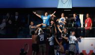 Retired Argentina forward Diego Maradona (top C) reacts before the Russia 2018 World Cup Group D football match between Nigeria and Argentina at the Saint Petersburg Stadium in Saint Petersburg on June 26, 2018. AFP / GABRIEL BOUYS 
