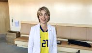 Sweden's Minister for Social Affairs Annika Strandhall poses, wearing Sweden's national soccer team jersey with number 21 assigned to Jimmy Durmaz, at the Parliament House in Stockholm, Sweden, June 27, 2018. (TT News Agency/Lars Larsson via REUTERS)