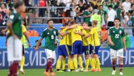 Sweden's players celebrate their victory after the Russia 2018 World Cup Group F football match between Mexico and Sweden at the Ekaterinburg Arena in Ekaterinburg on June 27, 2018. AFP / HECTOR RETAMAL