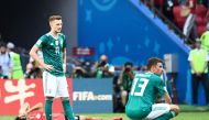 Germany's forward Marco Reus (L) and Germany's forward Thomas Mueller (R) react at the end of the Russia 2018 World Cup Group F football match between South Korea and Germany at the Kazan Arena in Kazan on June 27, 2018.  AFP / Jewel SAMAD 
