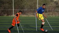 Members of a Palestinian amputee football team, which is made up of players most of who lost their legs in the conflict with Israel, play a game on a soccer pitch in the central Gaza Strip June 21, 2018. Picture taken June 21, 2018. Reuters/Ibraheem Abu M