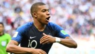 France's forward Kylian Mbappe celebrates after scoring their four goal during the Russia 2018 World Cup round of 16 football match between France and Argentina at the Kazan Arena in Kazan on June 30, 2018.  AFP / FRANCK FIFE