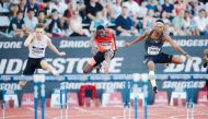 Qatar’s Abderrahman Samba (right) leads British Virgin Islands’ Kyron McMasters and Norway’s Karsten Warholm during the men’s 400M hurdles final at the Diamond League meet in the Charlety Stadium, Paris, yesterday. 