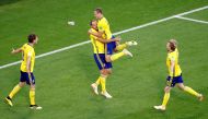 Sweden's Andreas Granqvist celebrates scoring their second goal from the penalty spot with team mates REUTERS/Damir Sagolj 