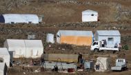 A general view of refugee tents erected in Syria seen from the Israeli-occupied Golan Heights, Israel July 1, 2018. REUTERS/Ammar Awad