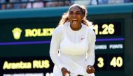 Serena Williams of the U.S. celebrates during the first round match against Netherlands' Arantxa Rus.  (REUTERS/Peter Nicholls)