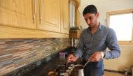 Overall, coffee drinkers were about 10 percent to 15 percent less likely to die than abstainers during a decade of follow-up. Differences by amount of coffee consumed and genetic variations were minimal. (AFP / Omar Haj Kadour) 