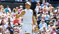 Garbine Muguruza of Spain celebrates winning her first round match against Naomi Broady of Great Britain. REUTERS/Toby Melville