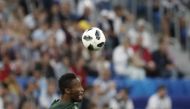 Lionel Messi (R) of Argentina in action against John Obi Mikel (L) of Nigeria during the 2018 FIFA World Cup Russia Group D match between Nigeria and Argentina at the Saint Petersburg Stadium in St. Petersburg, Russia on June 26, 2018. (Fatih Akta?/Anadol