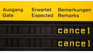 This October 27 2016 photo shows an information board showing cancelled flights due to a one-day strike of German flight operator Eurowings at the Berlin Tegel airport, AFP / Tobias Schwarz