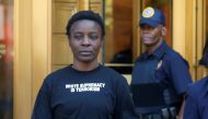 Outside court, the naturalized U.S. citizen from Congo said she climbed the landmark as a spur-of-the-moment protest over the Trump administration's zero-tolerance immigration policies that resulted in the separation of immigrant children from parents acc