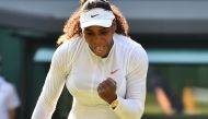 US player Serena Williams celebrates after beating France's Kristina Mladenovic 7-5, 7-6 in their women's singles third round match on the fifth day of the 2018 Wimbledon Championships at The All England Lawn Tennis Club in Wimbledon, southwest London, on