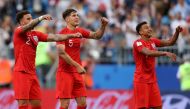 England's John Stones celebrates after the match with Kyle Walker and Jesse Lingard (REUTERS/Lee Smith)
