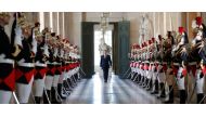 French President Emmanuel Macron walks through the Galerie des Bustes (Busts Gallery) to access the Versailles Palace's hemicycle to address both the upper and lower houses of the French parliament (National Assembly and Senate) at a special session in Ve