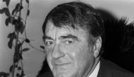 In this file photo taken on May 01, 1985 French writer, journalist and movie producer Claude Lanzmann poses in his home in Paris, following the release of his film 