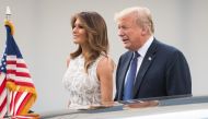 US President Donald Trump (R) and First Lady of the US Melania Trump arrive for a working dinner at The Parc du Cinquantenaire - Jubelpark Park in Brussels on July 11, 2018, during the North Atlantic Treaty Organization (NATO) summit. / AFP / POOL / BENOI