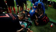 Croatia players celebrate next to an AFP photographer Yuri Cortez after Mario Mandzukic scores their second goal. Reuters/Carl Recine