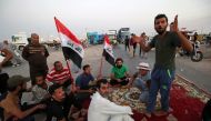 Protesters block the road to Iraq's Umm Qasr port, south of Basra, Iraq July 13, 2018. Reuters/Essam al-Sudani