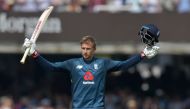 England's Joe Root celebrates scoring his century during the second One Day International (ODI) cricket match between England and India, at Lord's Cricket Ground in London on July 14, 2018. (AFP / OLLY )