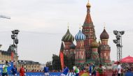 France and Croatia fans play a friendly match at the Red Square in Moscow on July 14, 2018 on the eve of the Russia 2018 World Cup final football match between France and Croatia. (AFP / Jewel SAMAD)