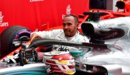 Mercedes' British driver Lewis Hamilton leaves his car after winning the German Formula One Grand Prix at the Hockenheim racing circuit on July 22, 2018 in Hockenheim, southern Germany. / AFP / Andrej ISAKOVIC