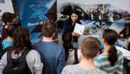 REPRESENTATIVE IMAGE: Romanian computer science students take part in an internship fair on the campus of the Polytechnic University on March 17, 2017 in Bucharest (AFP / Andrei Pungovschi) 