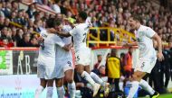Burnley’s Sam Vokes celebrates scoring their first goal with team-mates during the first leg of the qualifying round of the Europa League in Pittodrie Stadium, Aberdeen, Britain on Thursday.