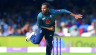 In this file photo taken on July 14, 2018 England's Adil Rashid bowls during the second One Day International (ODI) cricket match between England and India, at Lord's Cricket Ground in London. AFP / Olly Greenwood