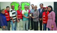 The Secretary-General of Bangladesh Red Crescent Society, Feroz Salah-Uddin, honours QRCS medical convoy by handing over a shield to the head of the mission, Dr. Abdullah R Al Naimi, Consultant of Urology and QRCS Board Member.
